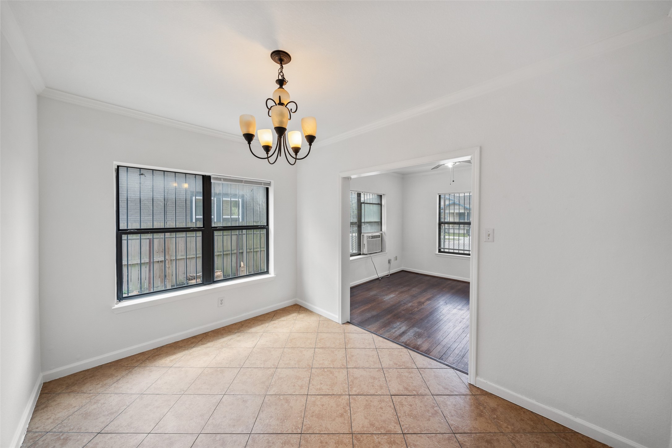 406 Quitman Street, Unit 2 Houston, TX 77009 - Photo 8 of 22 a view of an empty room with a window