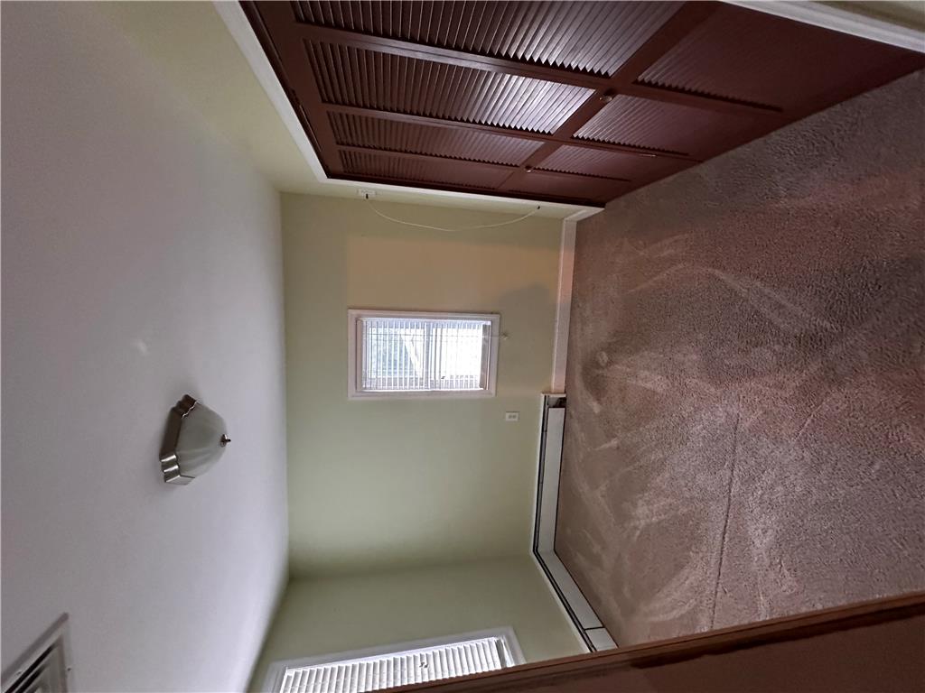 5128 3rd Street Whitehall, PA 18052 - Photo 26 of 26 The carpeted staircase provides access to the upper level of the home.