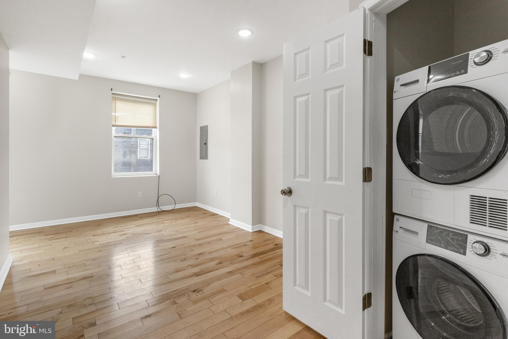 2604 Frankford Avenue, Unit 3 Philadelphia, PA 19125 - Photo 5 of 13 a view of livingroom with washer and dryer