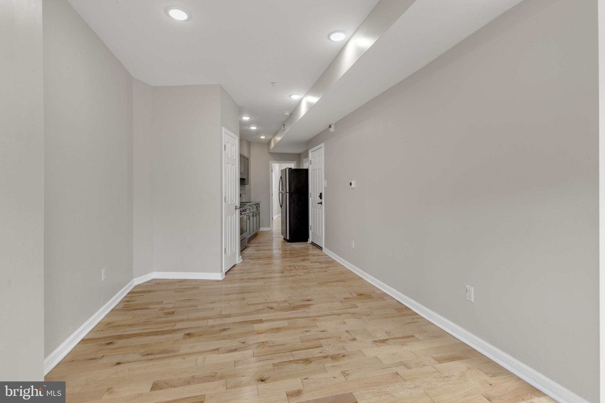 2604 Frankford Avenue, Unit 3 Philadelphia, PA 19125 - Photo 7 of 13 a view of hallway with wooden floor