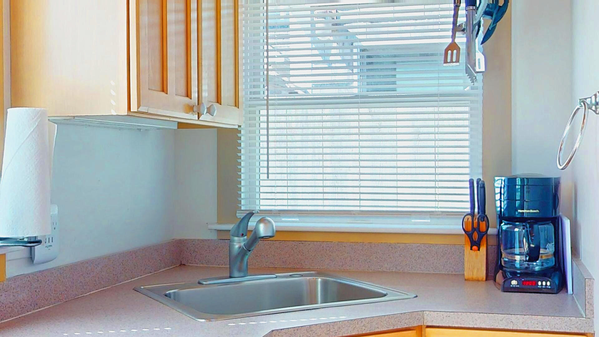 596 Shore Road, Unit G Truro, MA 02666 - Photo 8 of 27 a bathroom with a sink and a window