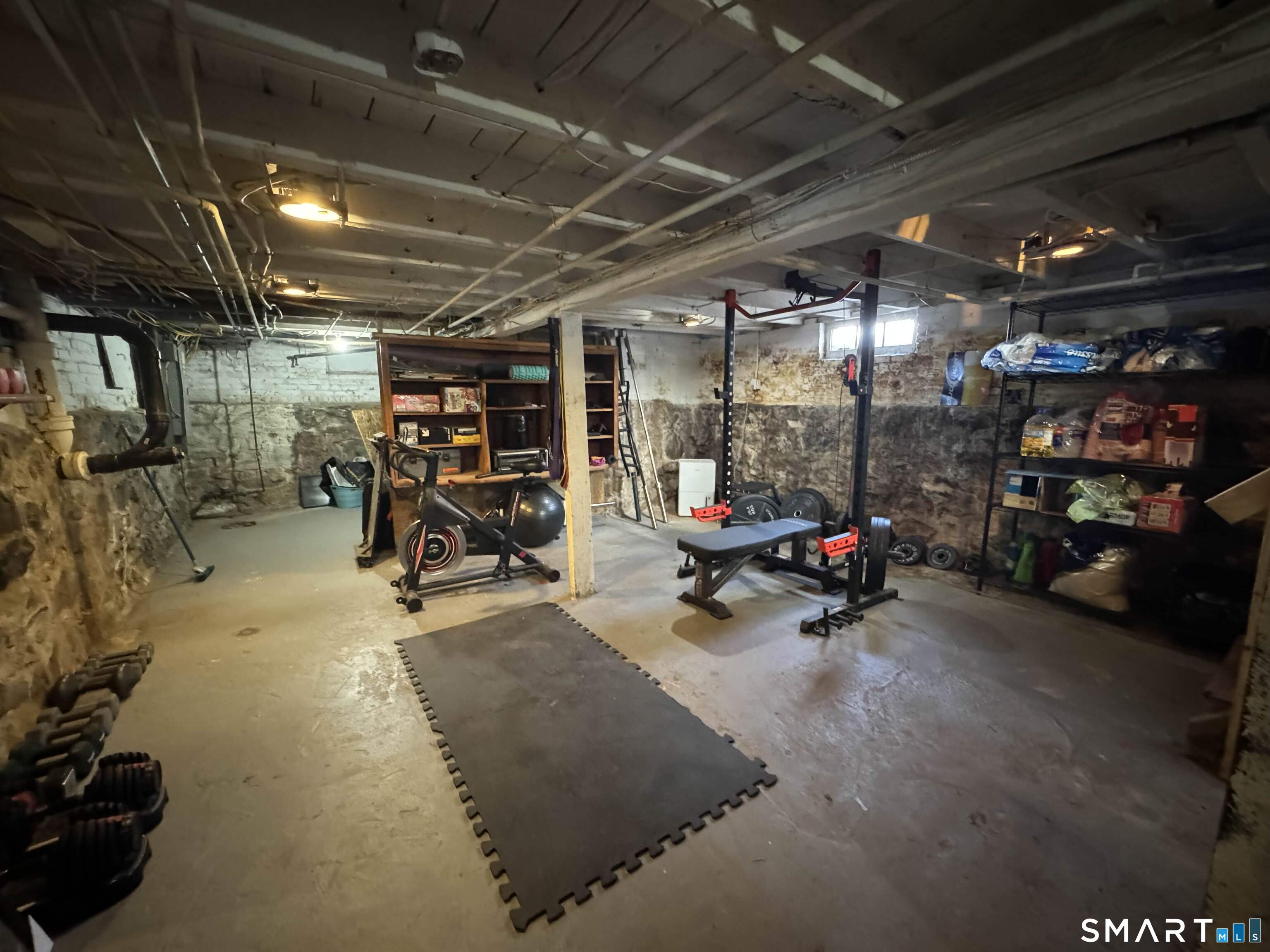 527 Worthington Ridge Berlin, CT 06037 - Photo 23 of 34 a view of a garage with a bike and storage