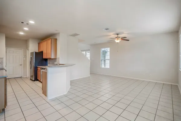 a view of kitchen with windows
