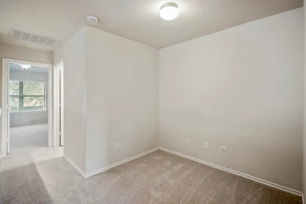 an empty room with an entryway