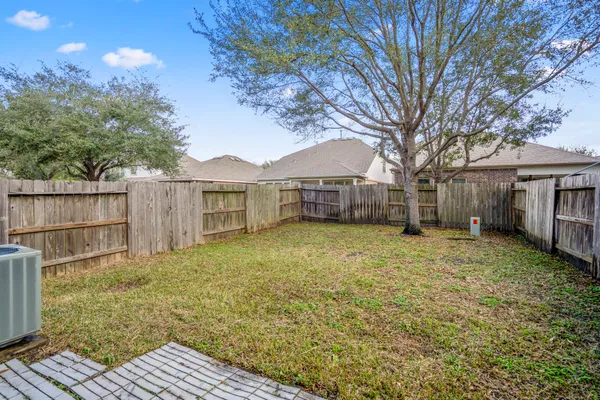 a view of a garden with a fountain
