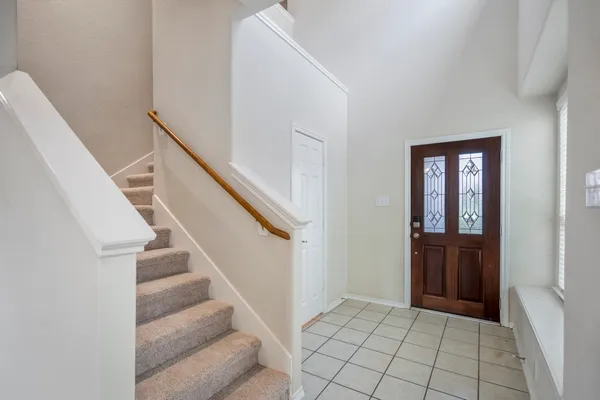 a view of an entryway with staircase