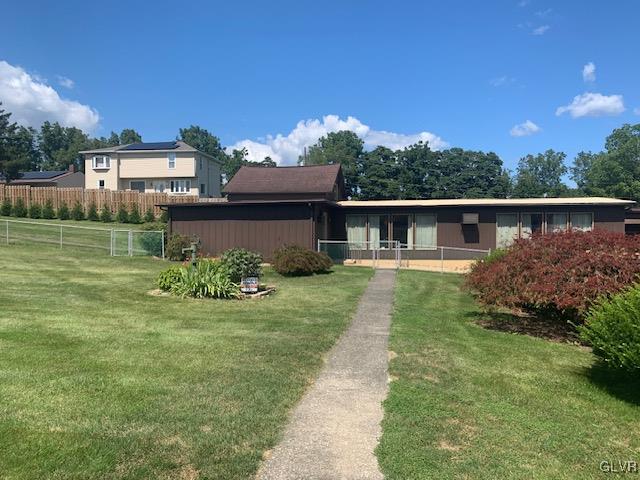 2423 Crest Street Coplay, PA 18037 - Photo 15 of 21 a front view of a house with garden