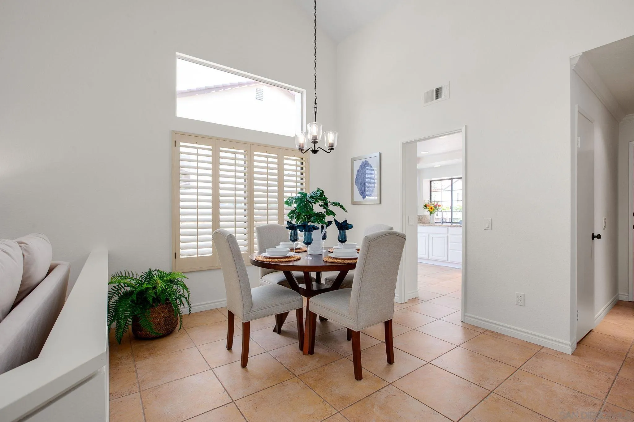 2041 Coolngreen Lane Encinitas, CA 92024 - Photo 14 of 36 a dining room with furniture and window
