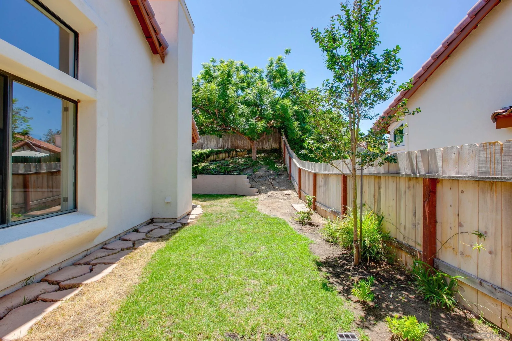 2041 Coolngreen Lane Encinitas, CA 92024 - Photo 32 of 36 a view of a backyard with plants