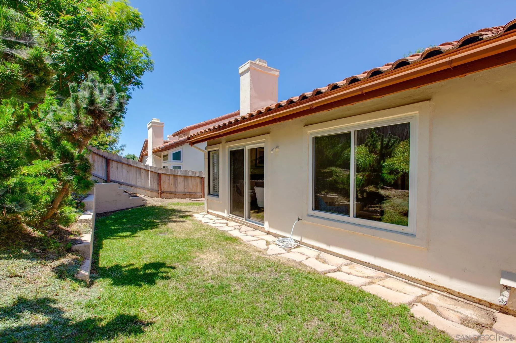2041 Coolngreen Lane Encinitas, CA 92024 - Photo 5 of 36 a view of a house with backyard and garden