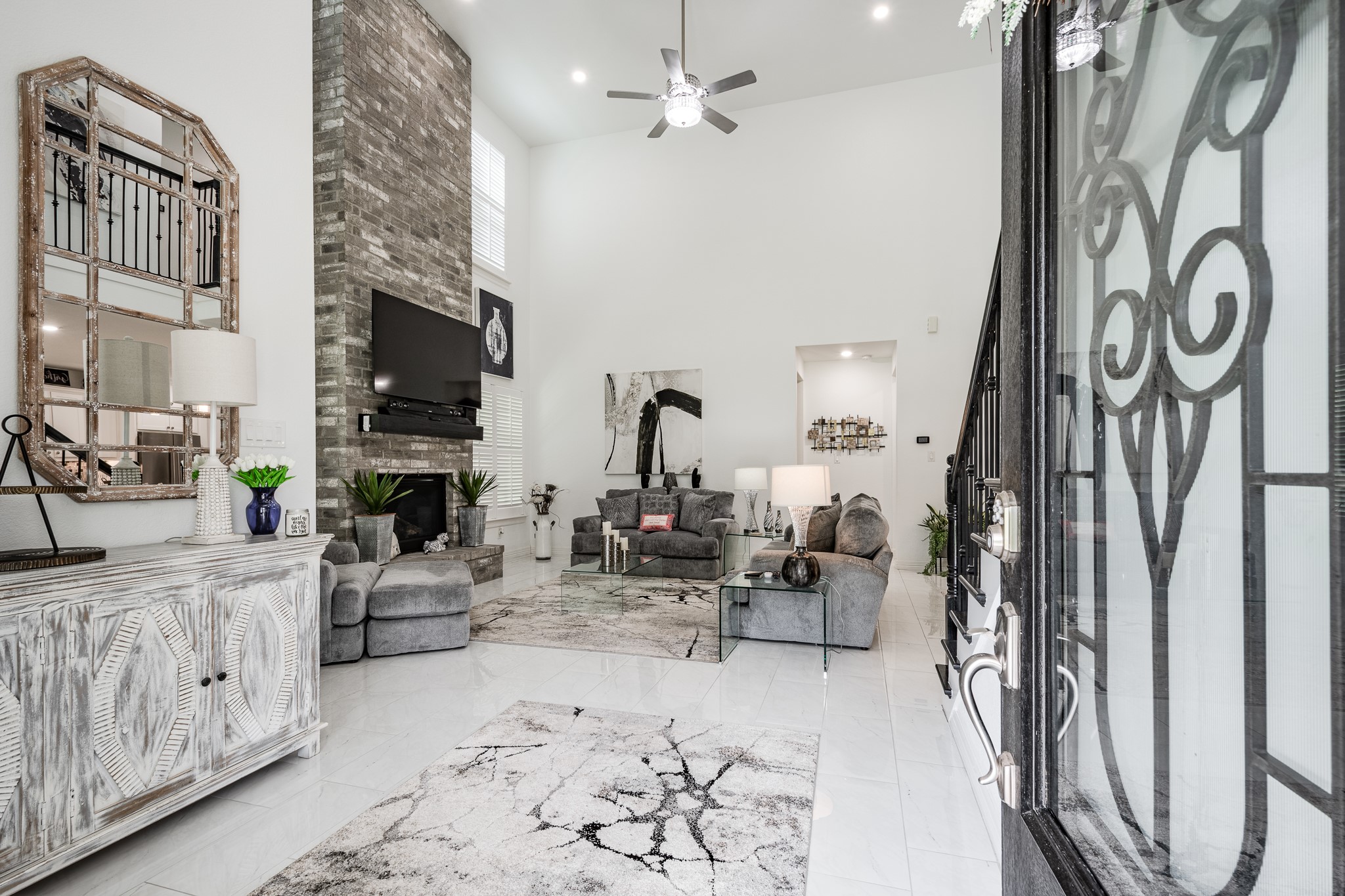 59 County Road Dayton, TX 77535 - Photo 11 of 50 a living room with fireplace furniture and a flat screen tv