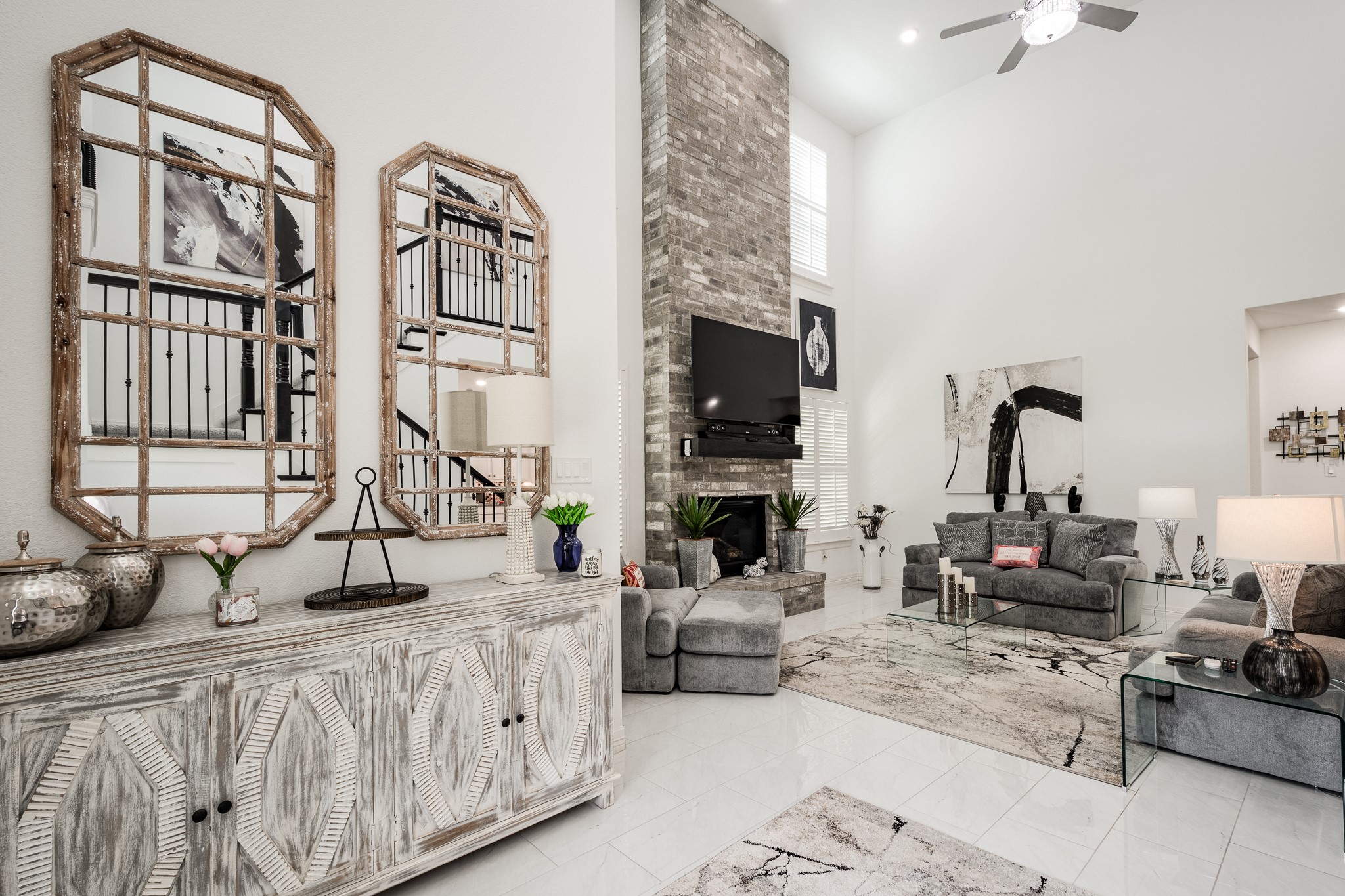 59 County Road Dayton, TX 77535 - Photo 12 of 50 a living room with furniture a flat screen tv and a fireplace