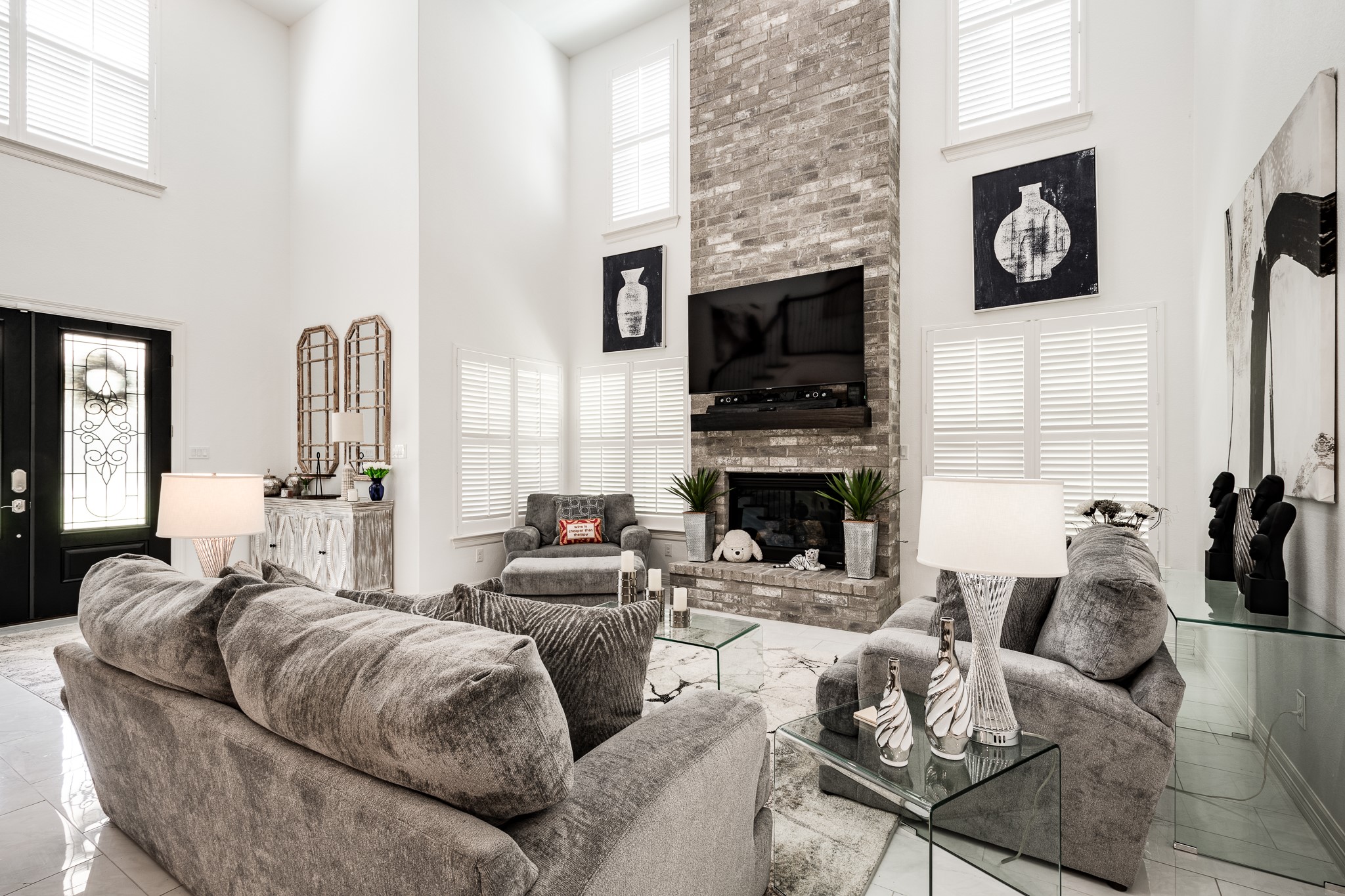 59 County Road Dayton, TX 77535 - Photo 15 of 50 a living room with furniture a fireplace and a flat screen tv