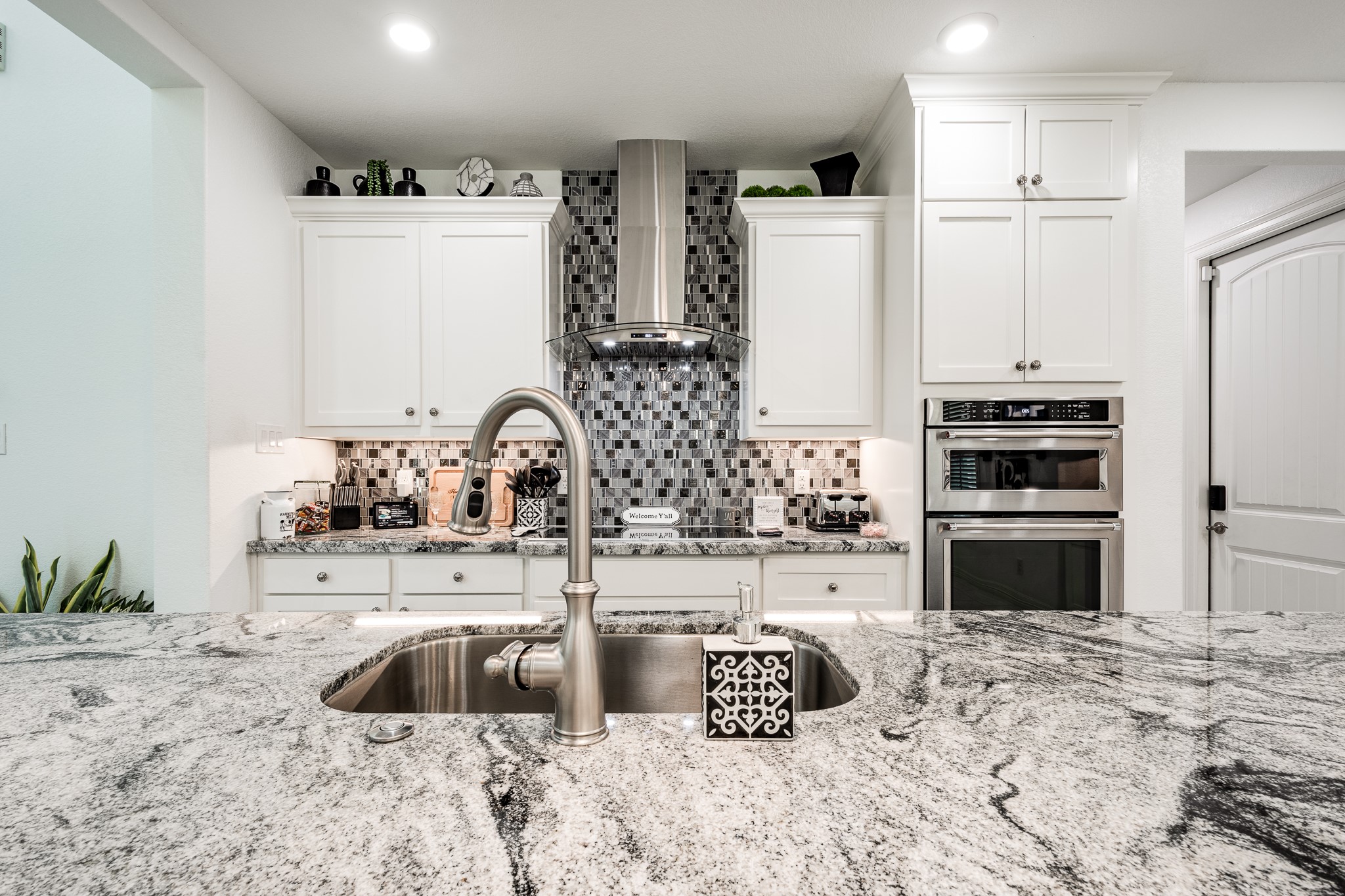 59 County Road Dayton, TX 77535 - Photo 21 of 50 a kitchen with a sink a stove and a refrigerator