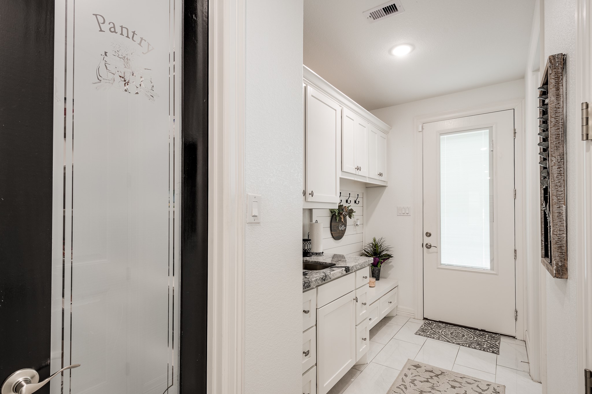 59 County Road Dayton, TX 77535 - Photo 25 of 50 a large white kitchen with stainless steel appliances