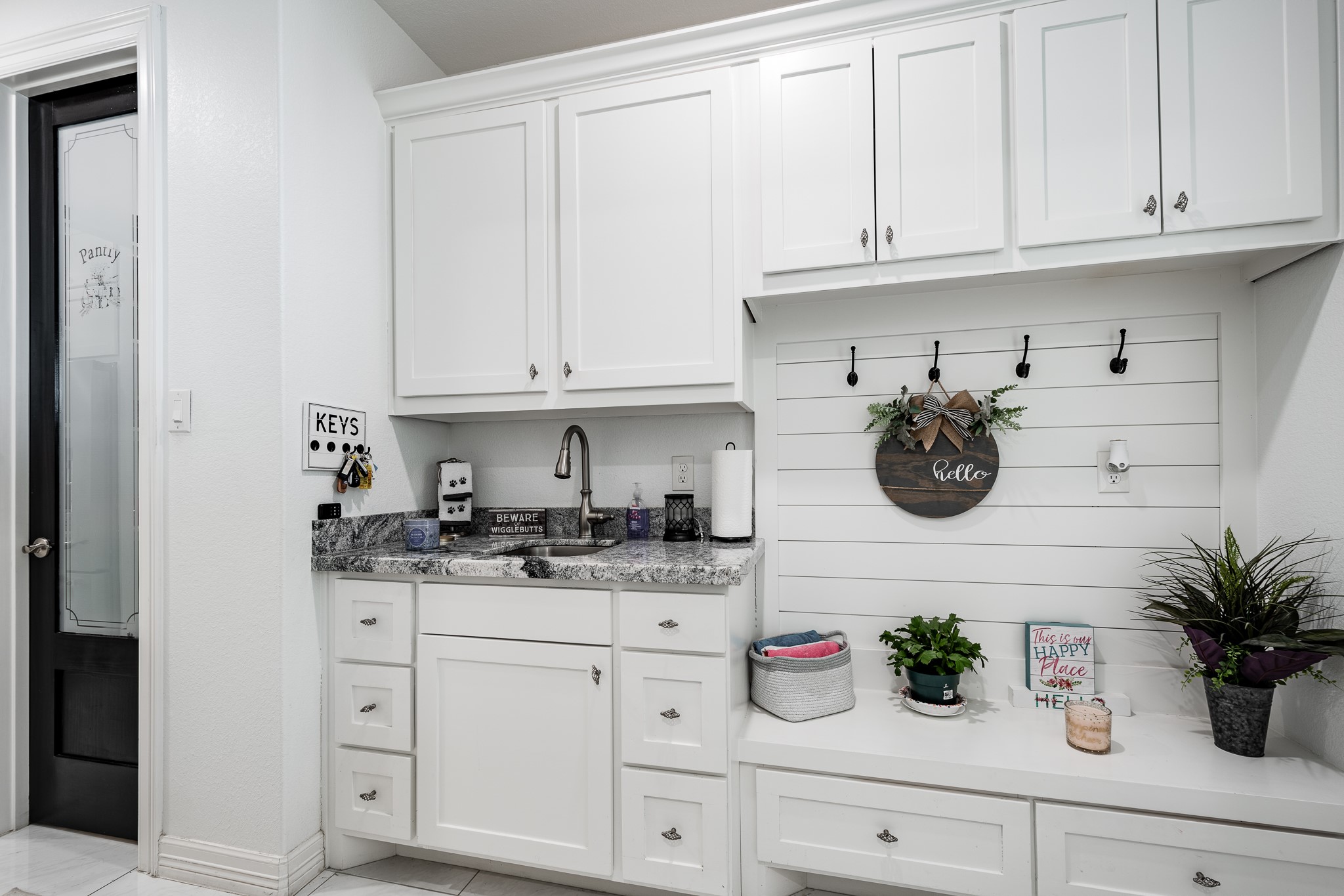 59 County Road Dayton, TX 77535 - Photo 26 of 50 a kitchen with white cabinets and a stove