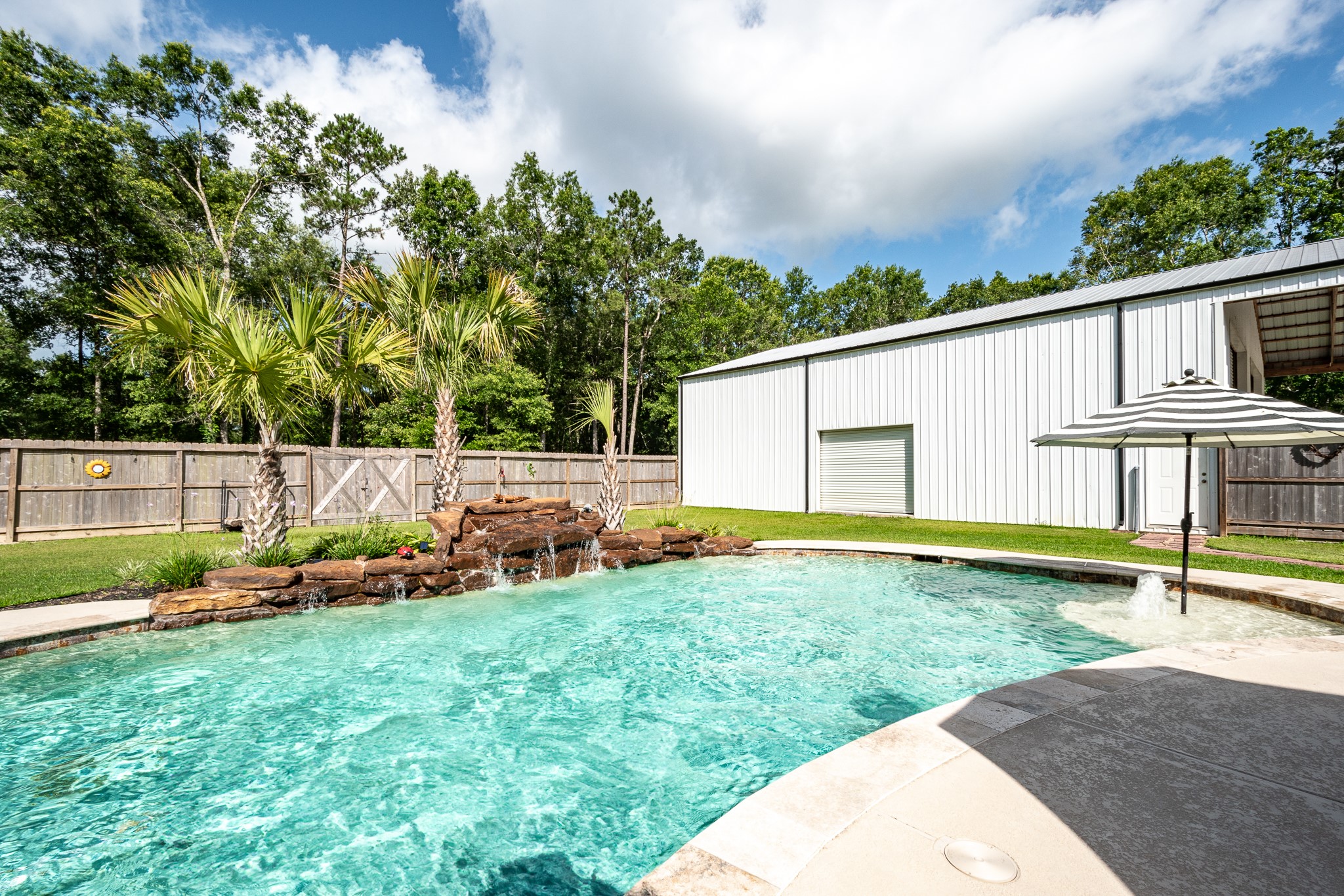 59 County Road Dayton, TX 77535 - Photo 40 of 50 a view of a house with backyard and sitting area