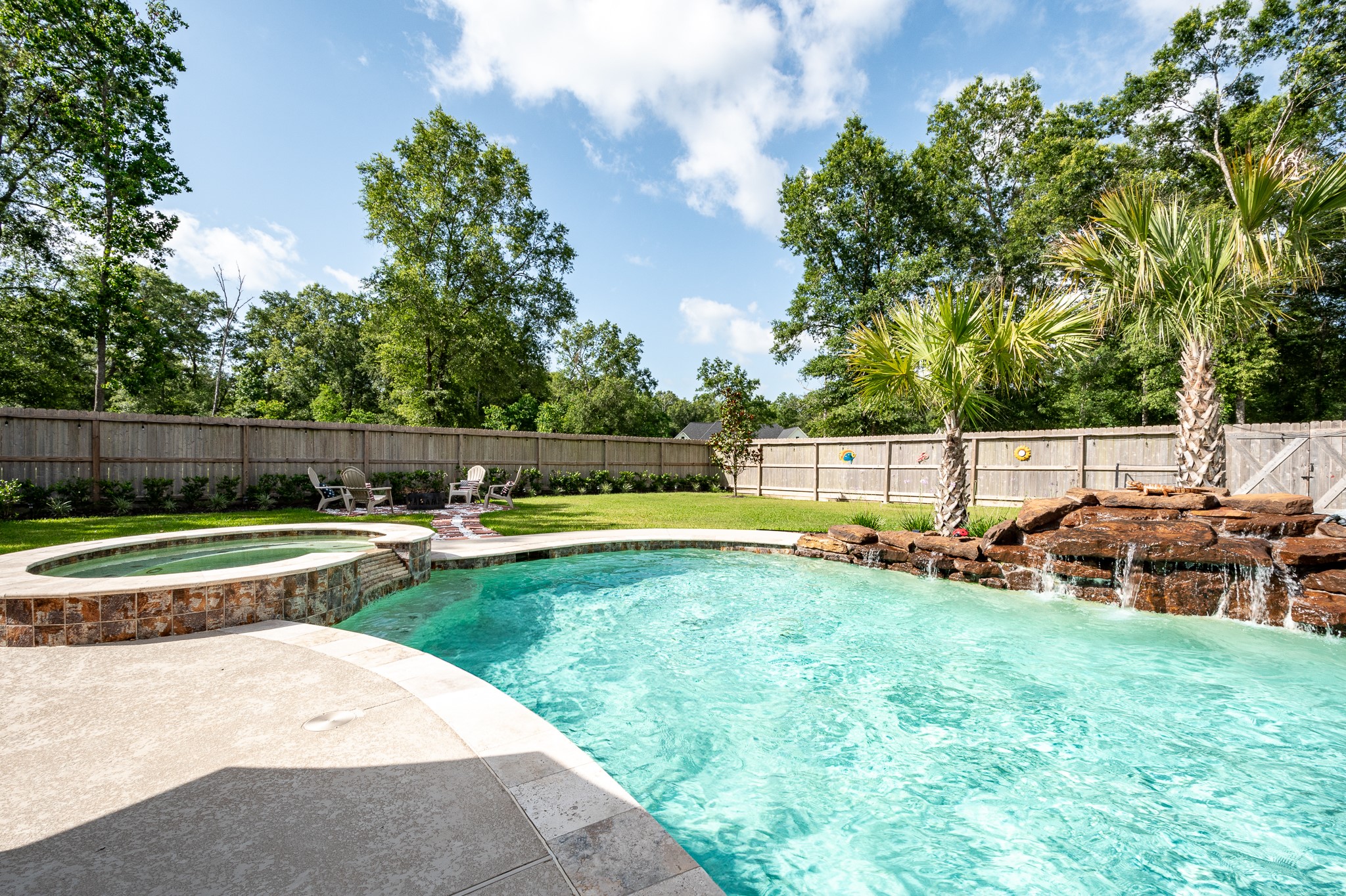 59 County Road Dayton, TX 77535 - Photo 41 of 50 a view of backyard with swimming pool and furniture