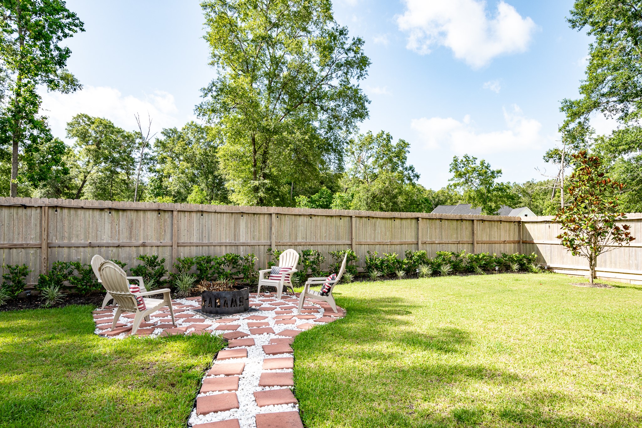 59 County Road Dayton, TX 77535 - Photo 42 of 50 a view of a backyard with sitting area