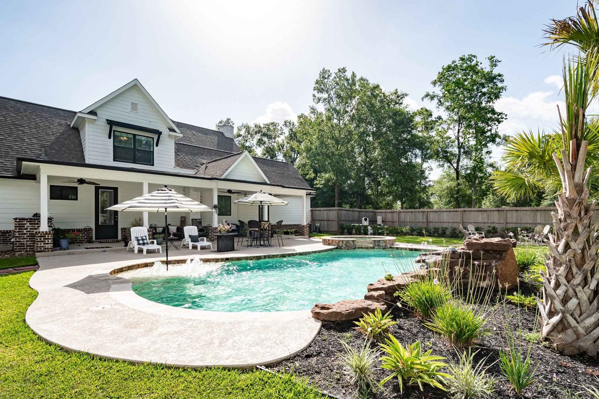 59 County Road Dayton, TX 77535 - Photo 43 of 50 an aerial view of a house with garden and swimming pool