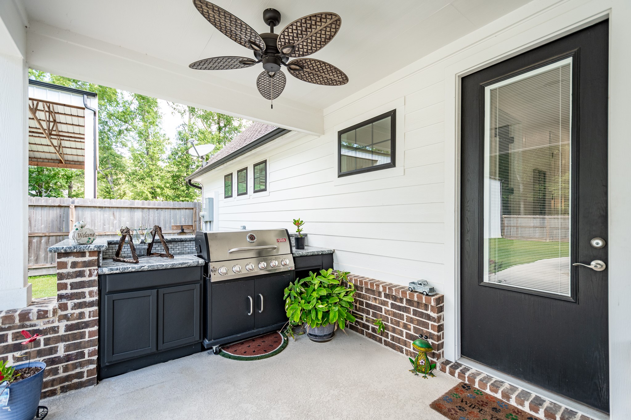 59 County Road Dayton, TX 77535 - Photo 47 of 50 a kitchen with a stove a refrigerator and a sink