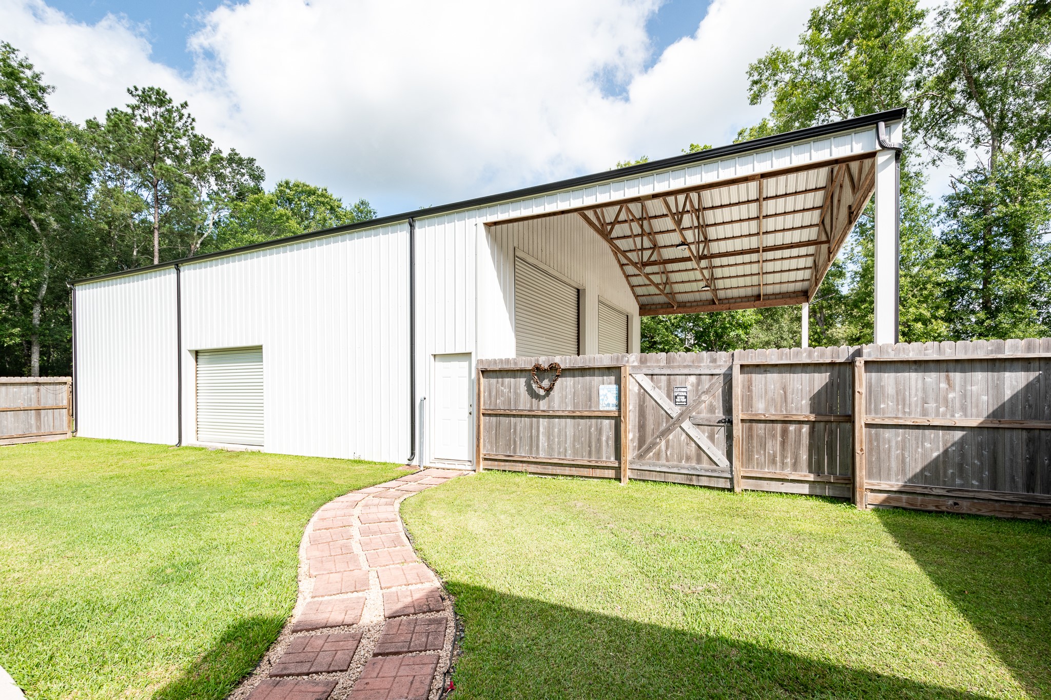 59 County Road Dayton, TX 77535 - Photo 48 of 50 a view of a backyard with swimming pool