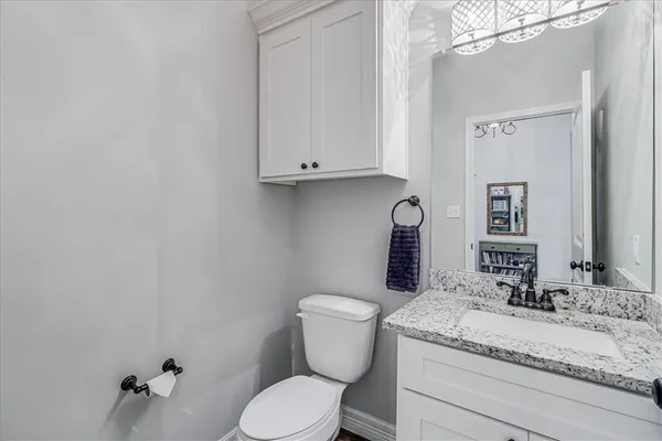 a bedroom with a bed and dresser