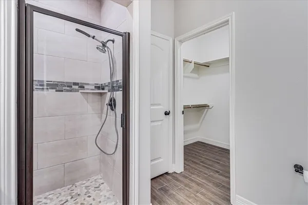 a view of an empty walk in closet