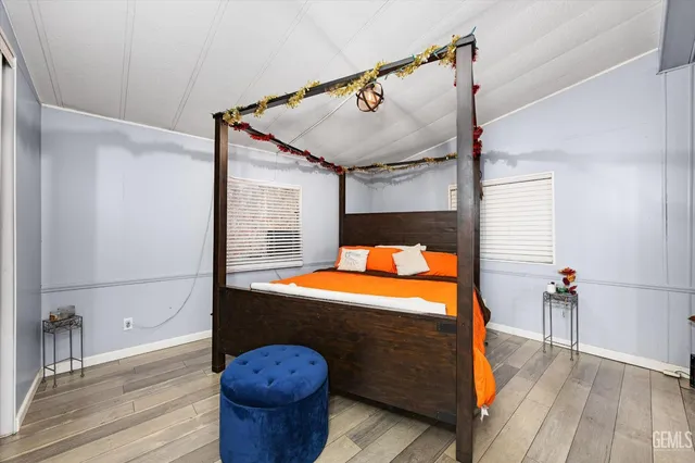 a room with furniture and wooden floor