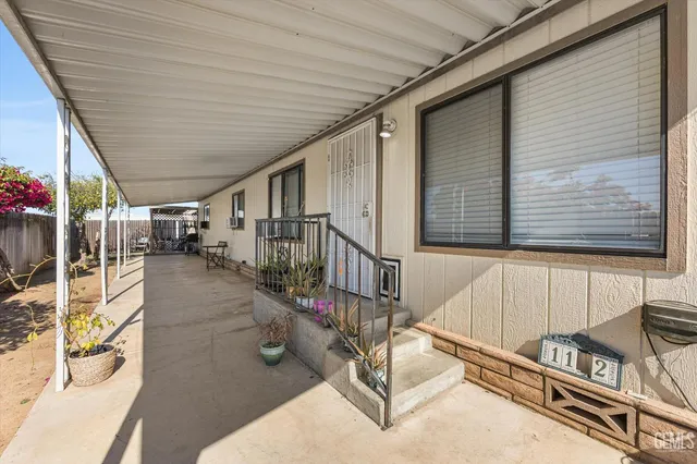 a view of entryway with wooden stairs