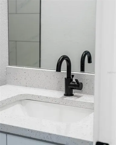 a close view of a faucet a sink and a faucet