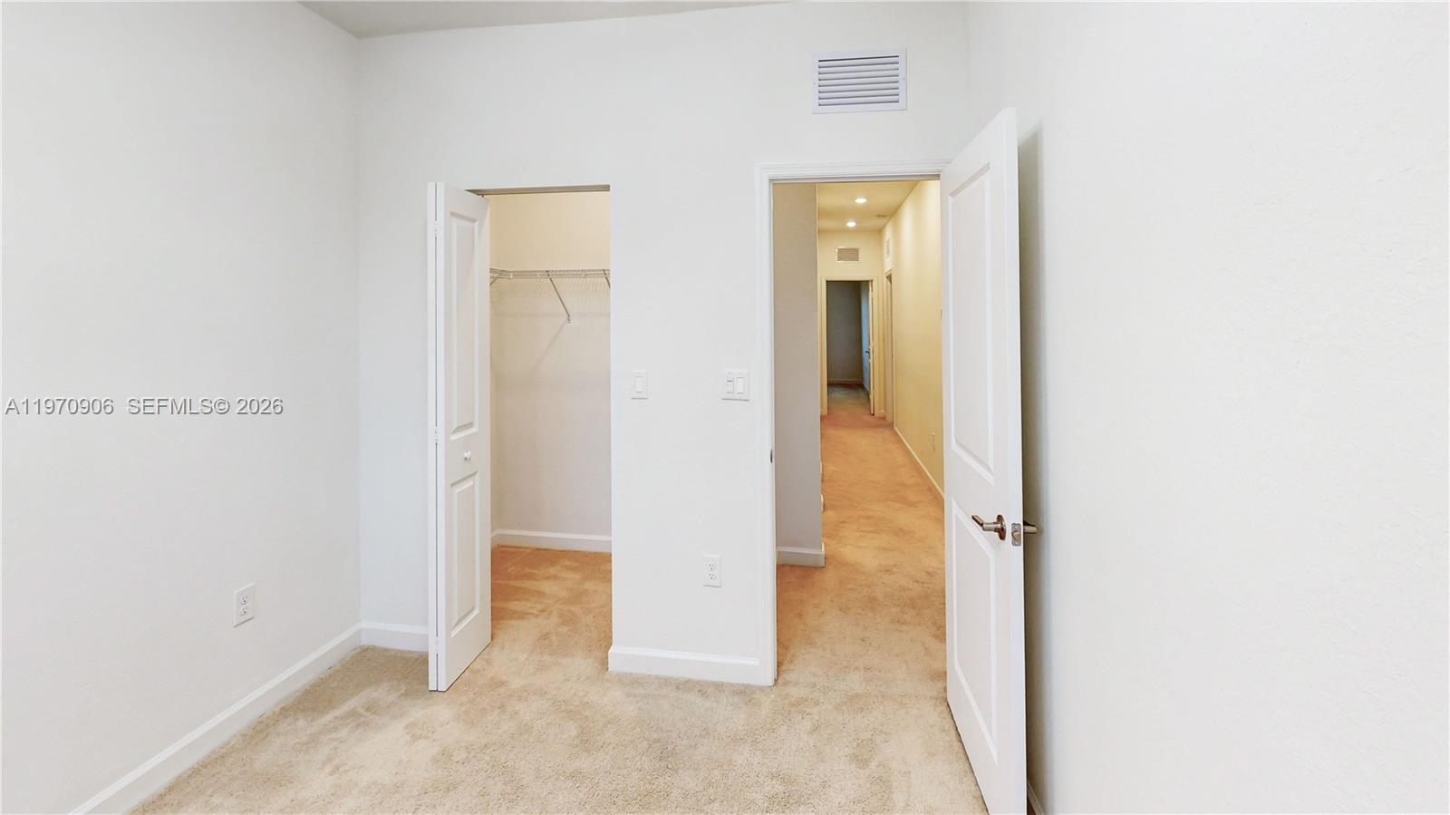 13158 Southwest 233rd Street Homestead, FL 33032 - Photo 29 of 72 a view of a hallway with wooden floor
