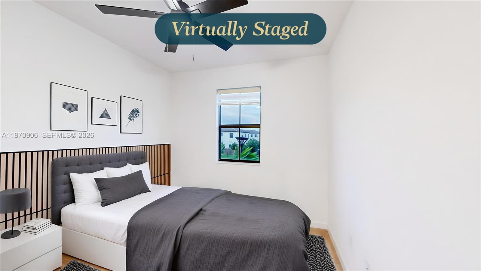 13158 Southwest 233rd Street Homestead, FL 33032 - Photo 36 of 72 a bedroom with a bed and a window