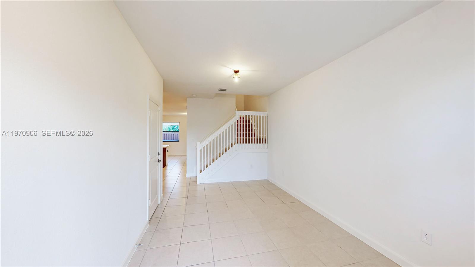 13158 Southwest 233rd Street Homestead, FL 33032 - Photo 4 of 72 a view of a hallway with entryway