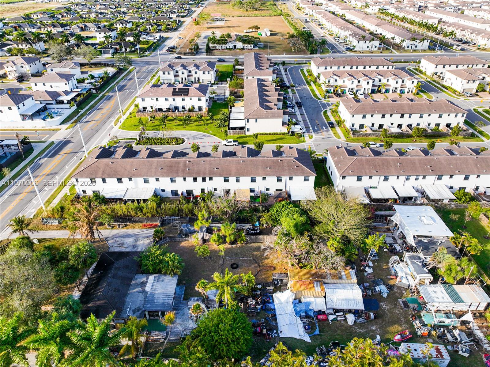 13158 Southwest 233rd Street Homestead, FL 33032 - Photo 56 of 72 an aerial view of swimming pool patio and outdoor seating