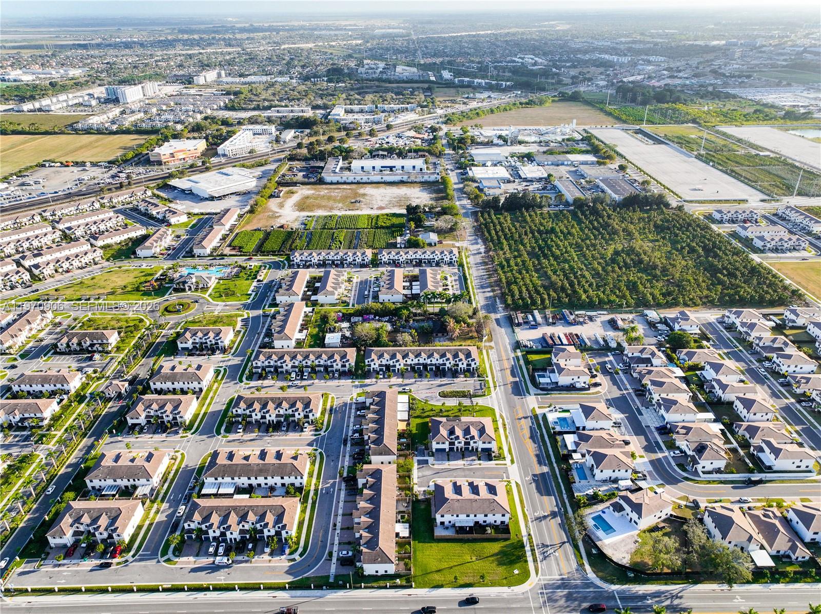 13158 Southwest 233rd Street Homestead, FL 33032 - Photo 58 of 72 an aerial view of residential building and lake view