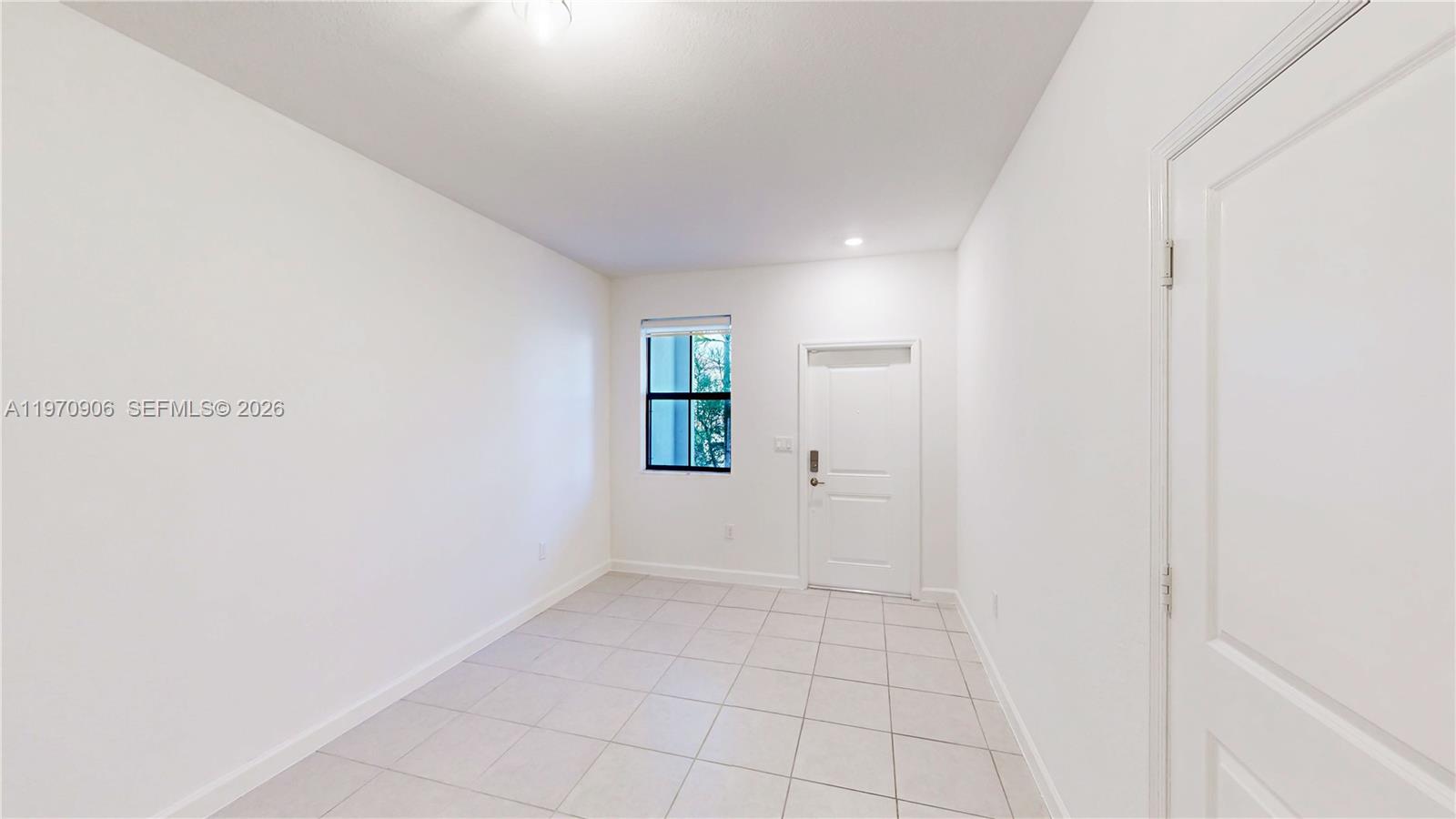 13158 Southwest 233rd Street Homestead, FL 33032 - Photo 6 of 72 a view of an empty room