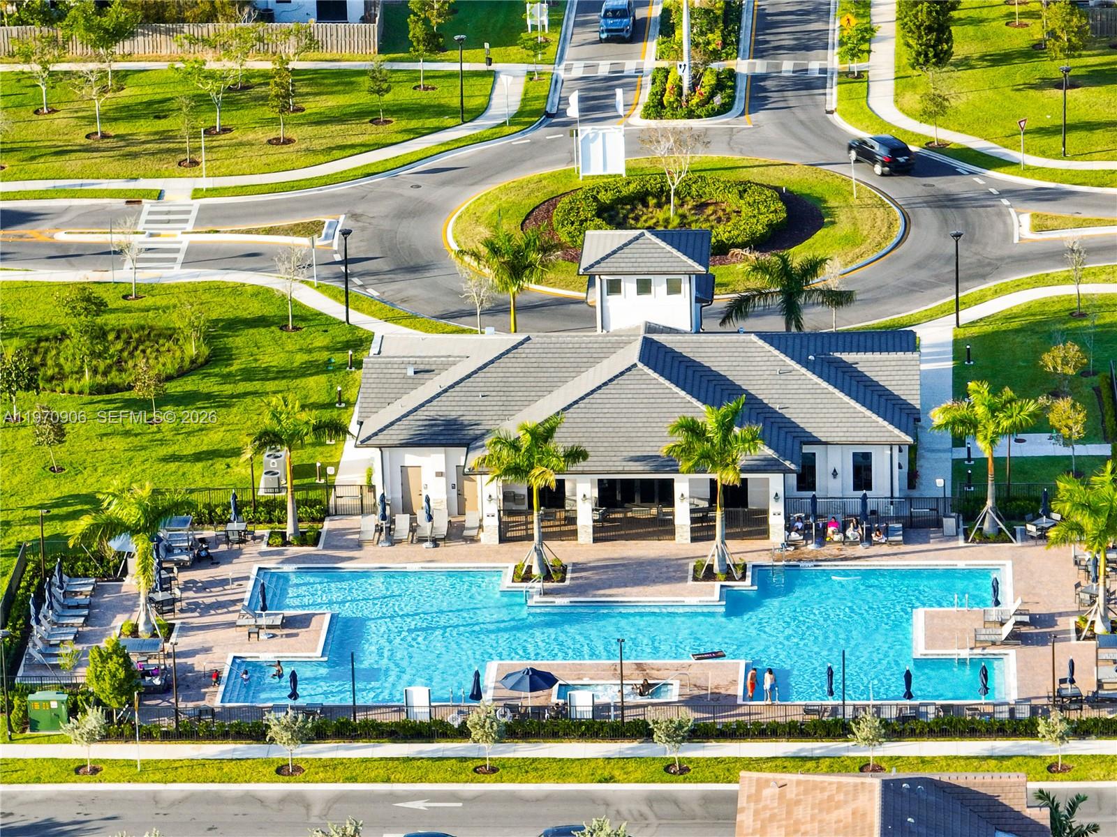 13158 Southwest 233rd Street Homestead, FL 33032 - Photo 63 of 72 a view of pool with outdoor seating