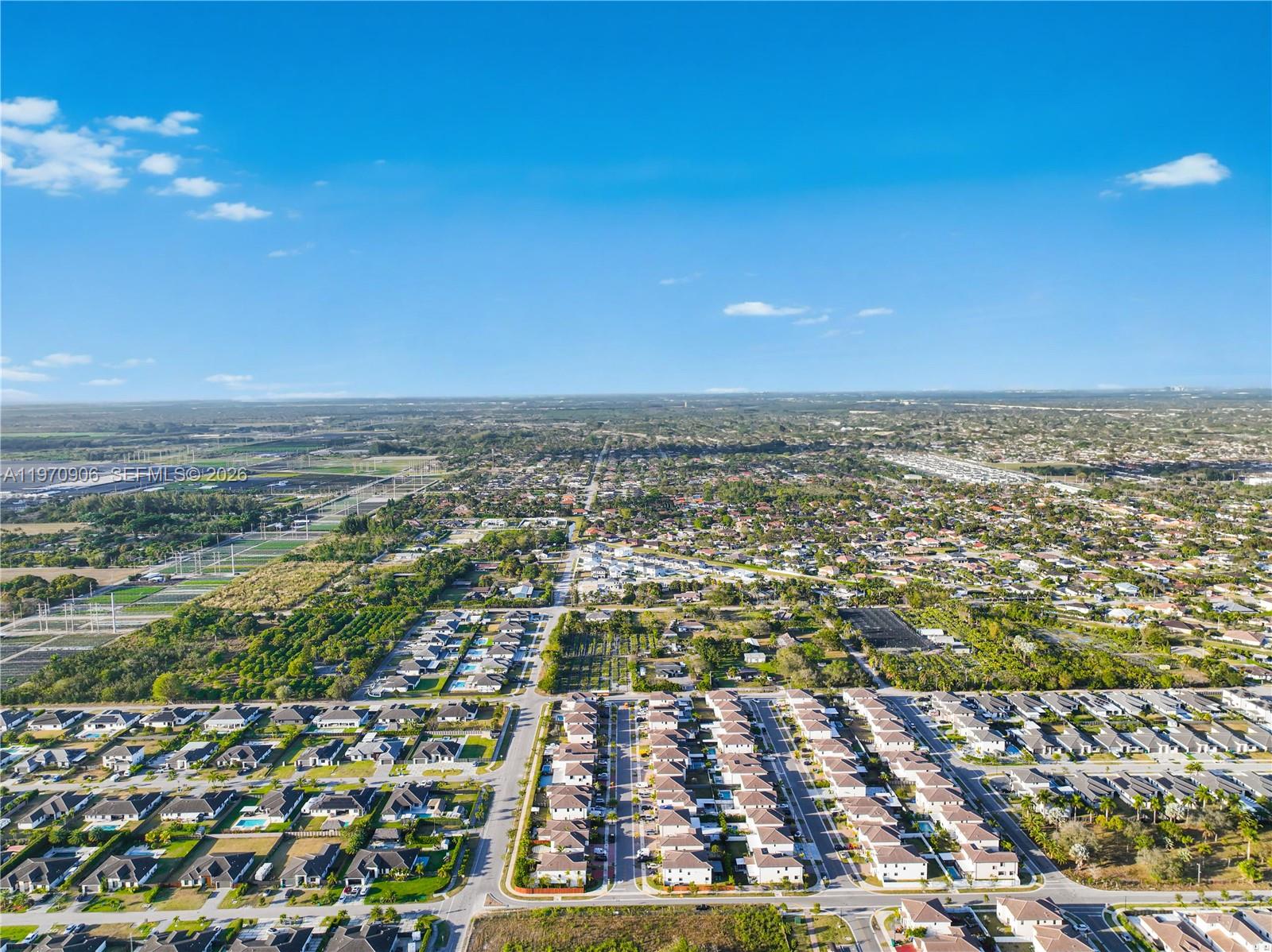 13158 Southwest 233rd Street Homestead, FL 33032 - Photo 69 of 72 an aerial view of residential building and ocean