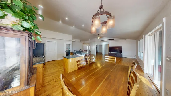 a view of room with window and wooden floor