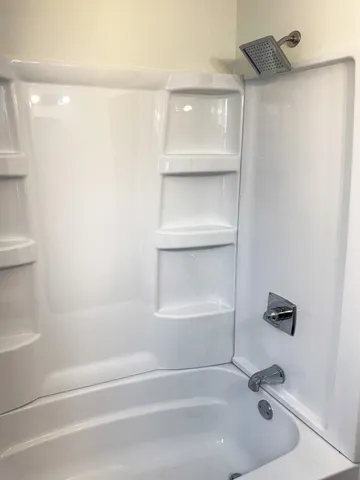 a bathroom with a bathtub