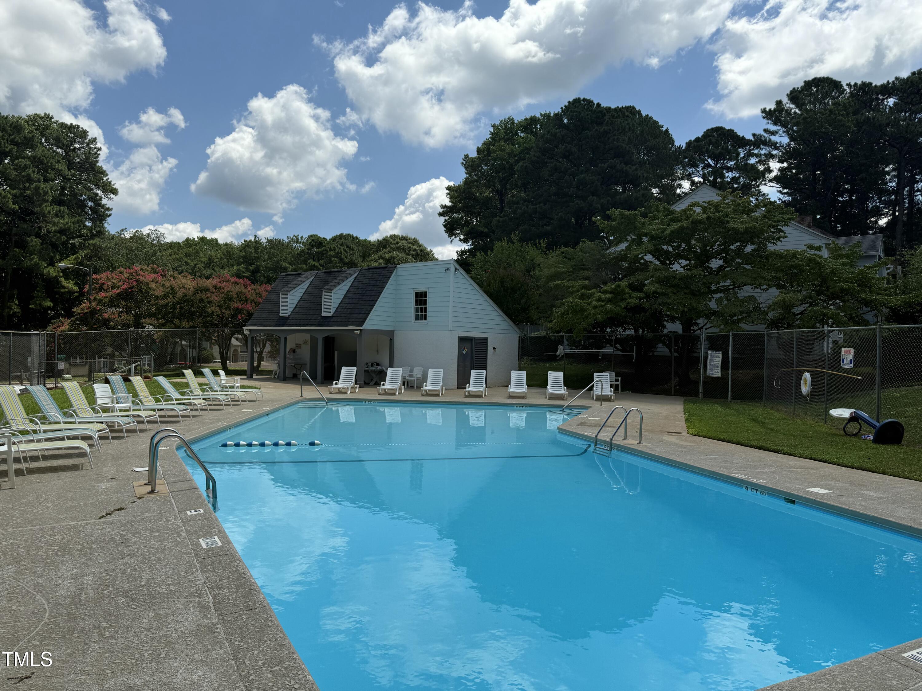 1344 Garden Crest Circle Raleigh, NC 27609 - Photo 4 of 6 a view of house with swimming pool having outdoor seating
