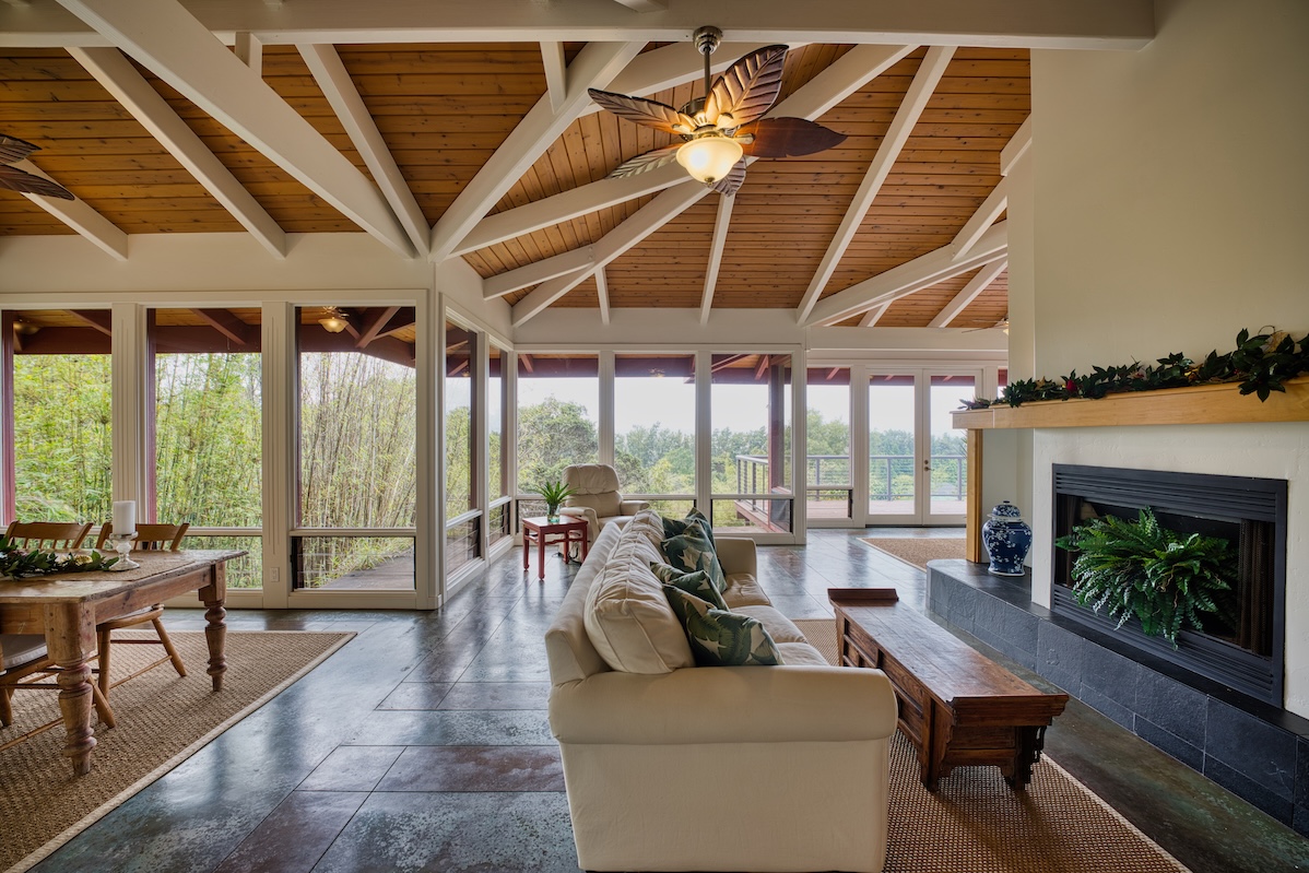 64-5221 Iokua Place Kamuela, HI 96743 - Photo 6 of 30 a living room with furniture and a fireplace