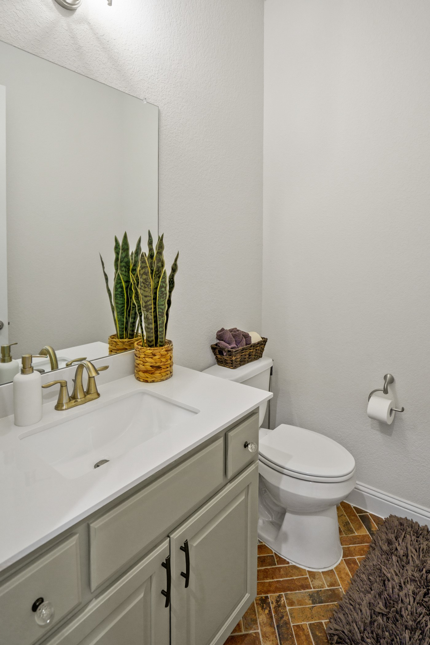 224 Diamondback Drive Georgetown, TX 78628 - Photo 18 of 39 a bathroom with a sink toilet and mirror