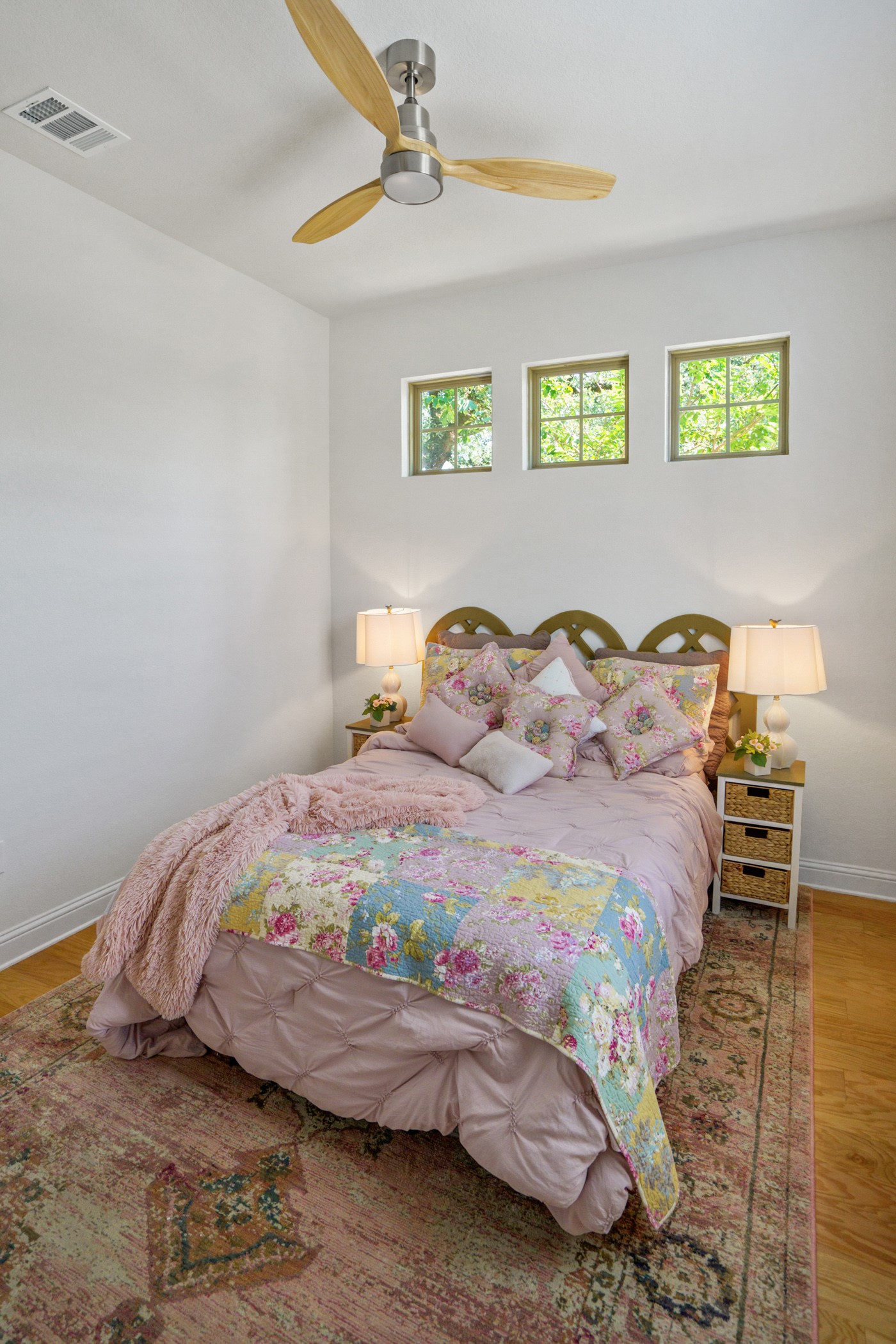 224 Diamondback Drive Georgetown, TX 78628 - Photo 19 of 39 a bedroom with a bed and painting on the wall