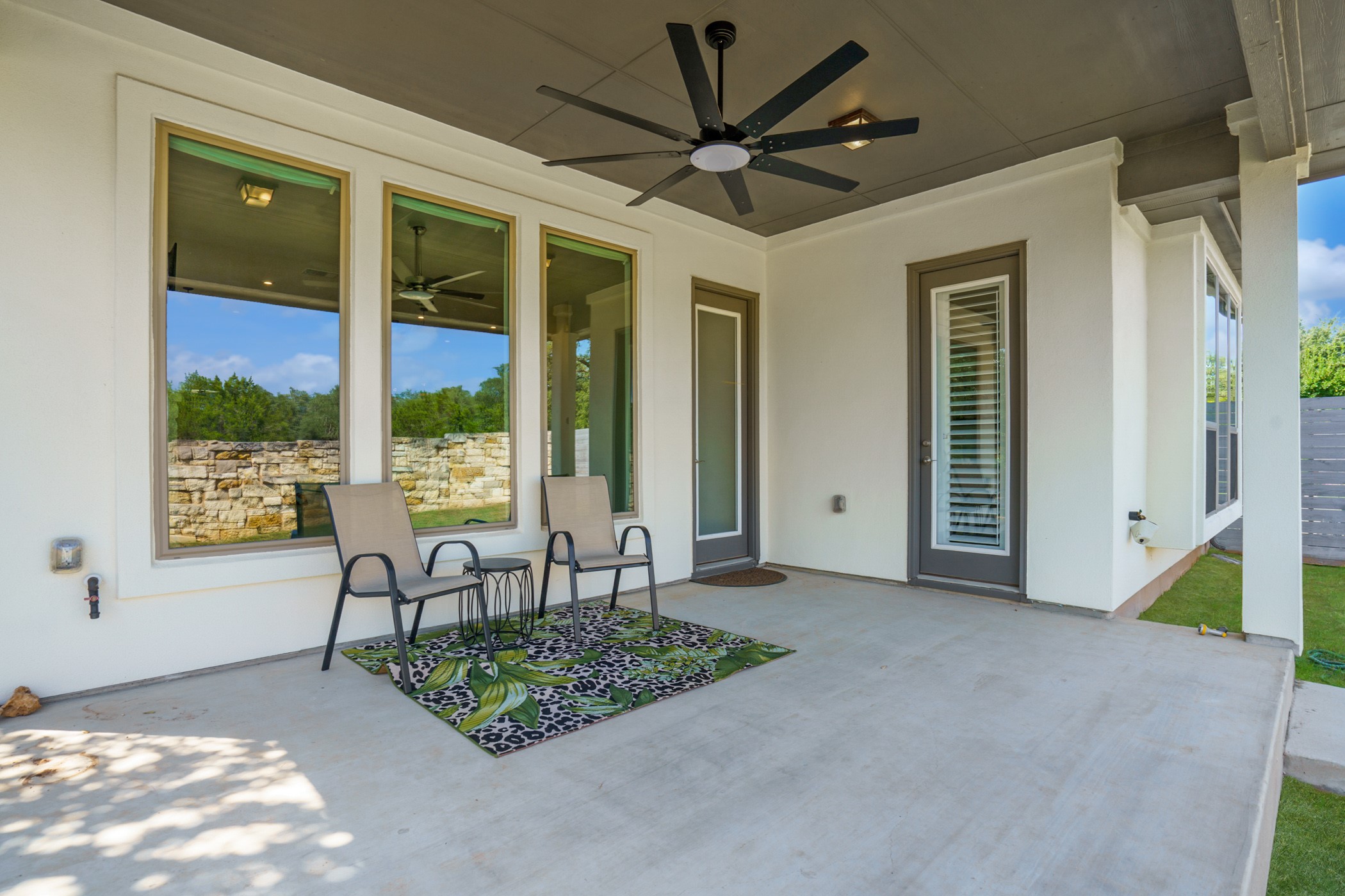 224 Diamondback Drive Georgetown, TX 78628 - Photo 38 of 39 a view of a livingroom with furniture and a floor to ceiling window