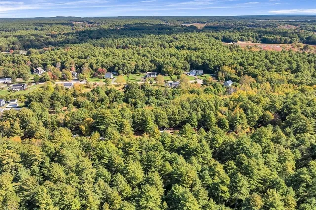 a view of a field with an outdoor space