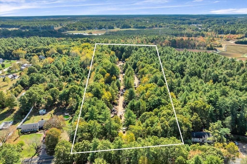35 Silva Street Carver, MA 02330 - Photo 15 of 26 a view of lake with green field