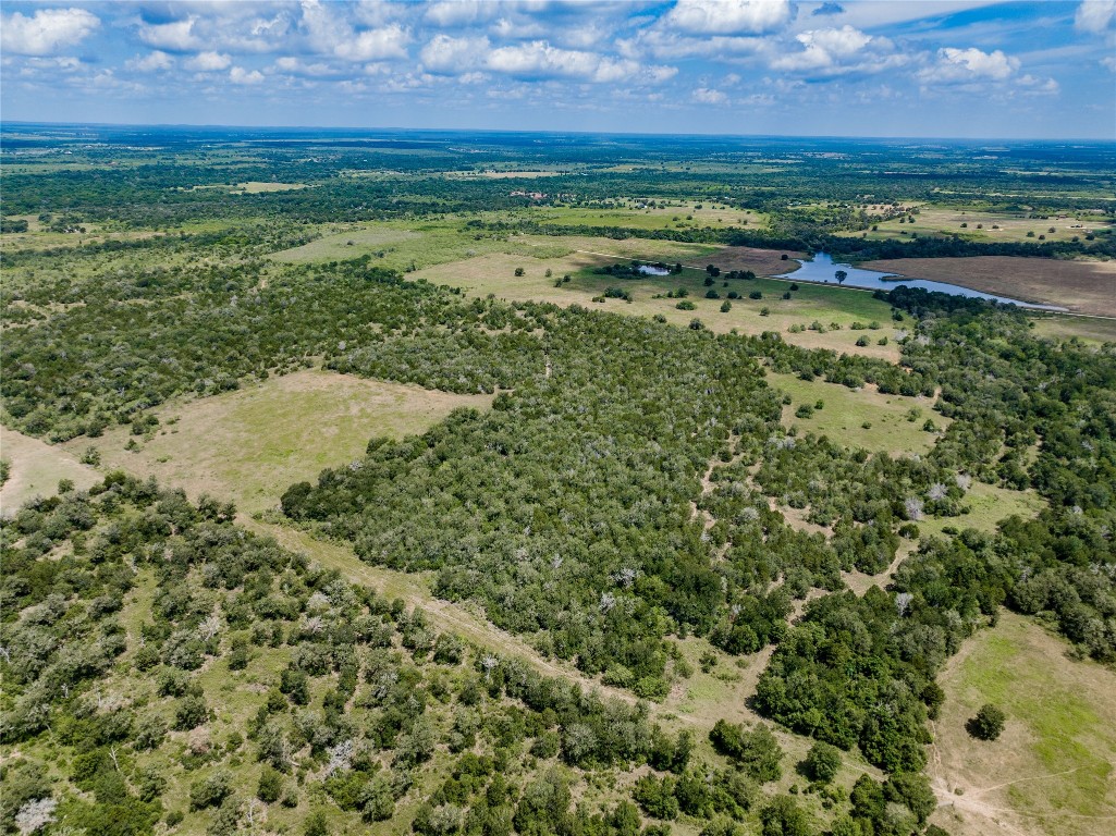 13 Armstrong Road Waelder, TX 78959 - Photo 5 of 6 a view of a field with an outdoor space