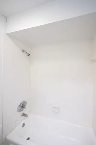 a bathroom with a bathtub